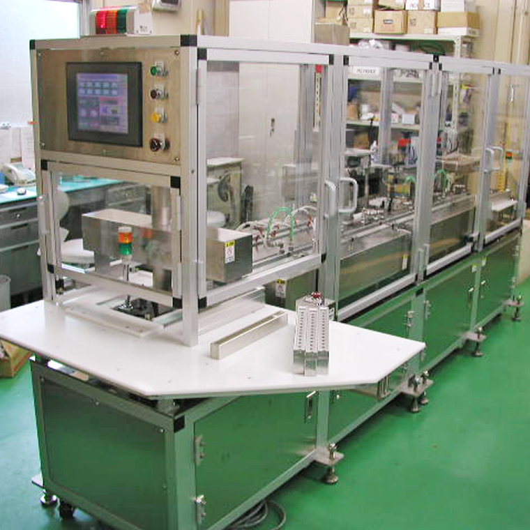 Photo of Lipstick metal mold filling machine